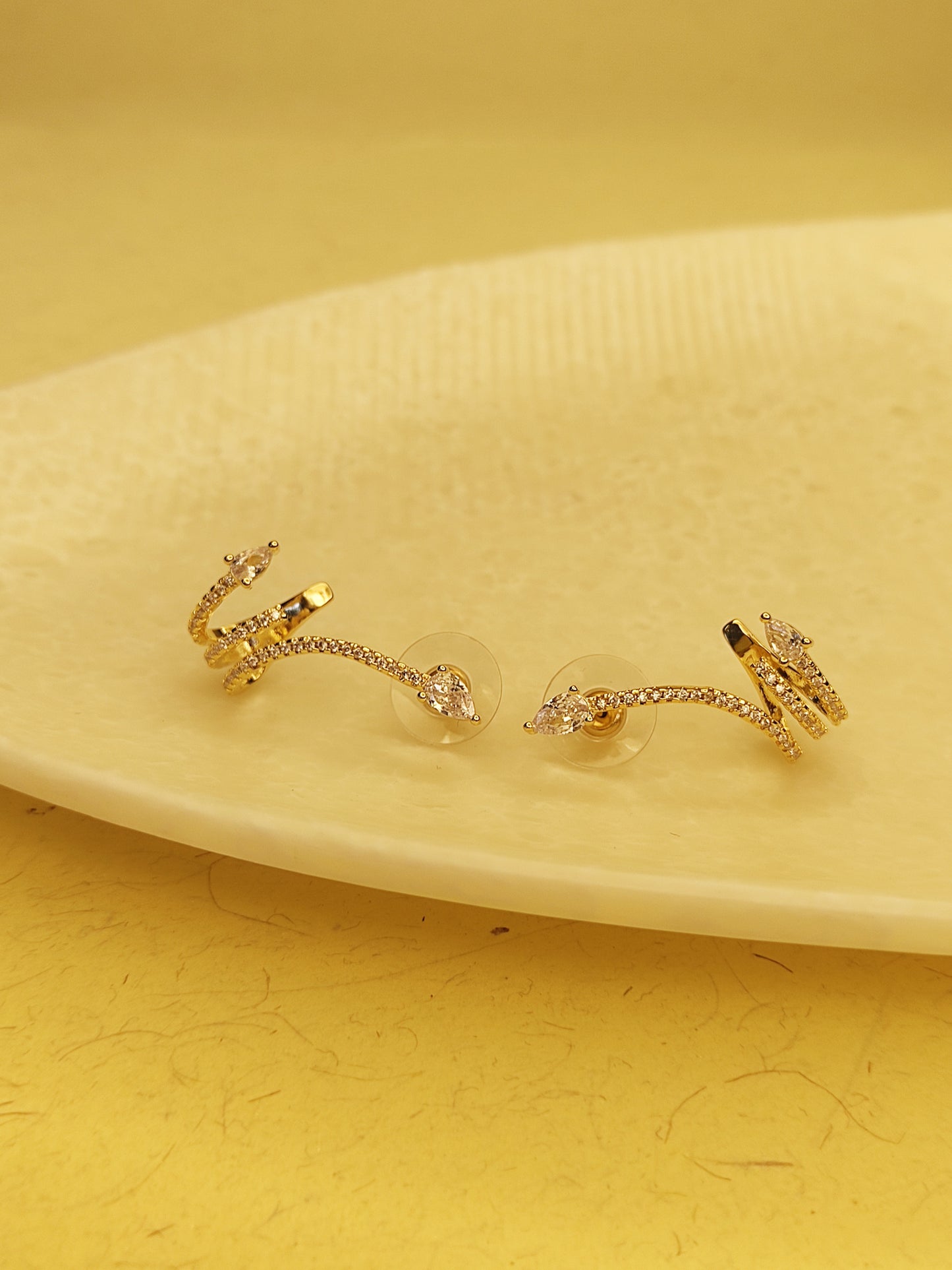 140 Gold Spiral Arrow Earrings