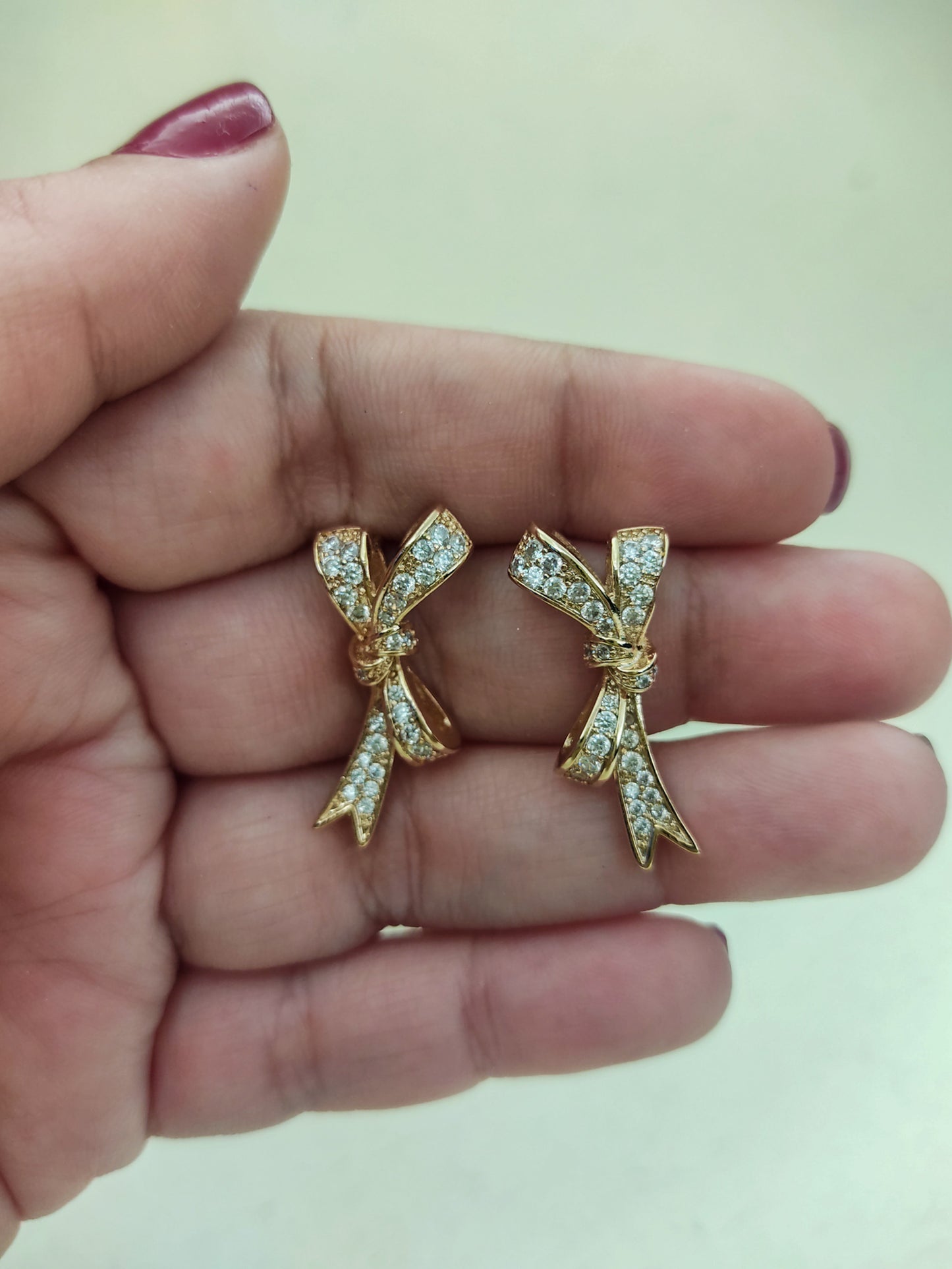 142 Gold Bowtie Studs