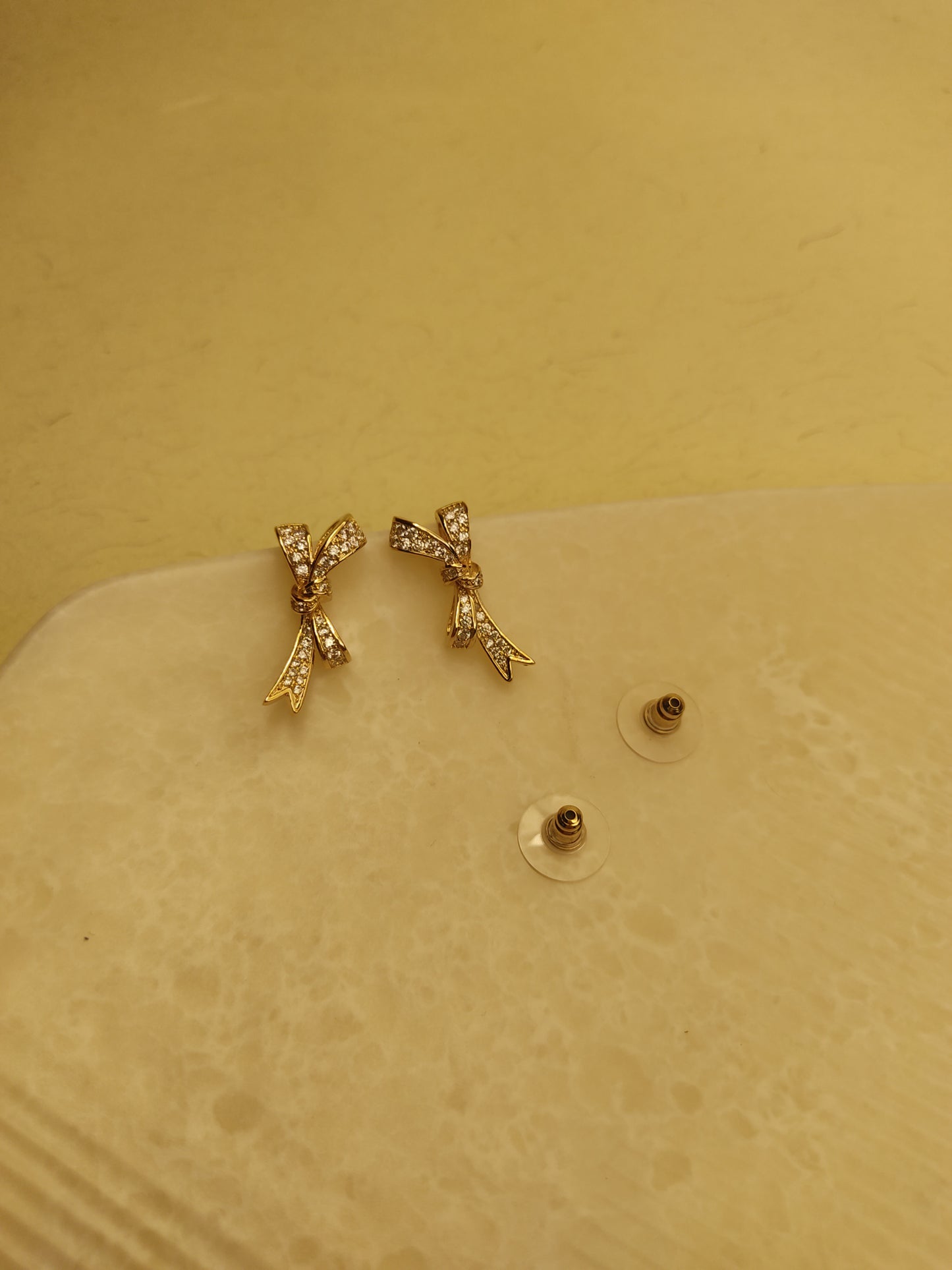 142 Gold Bowtie Studs