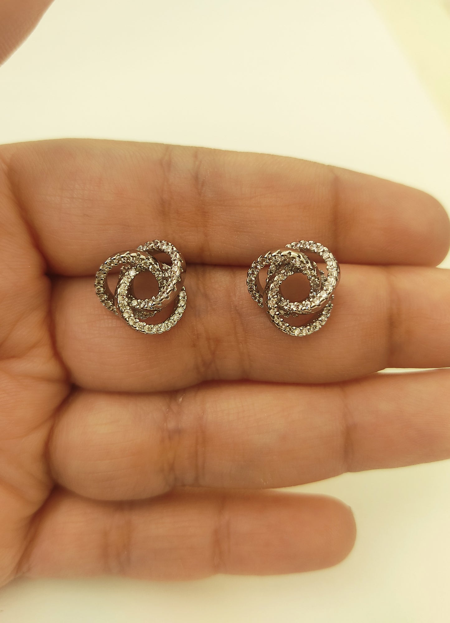 114  Silver Abstract Studs