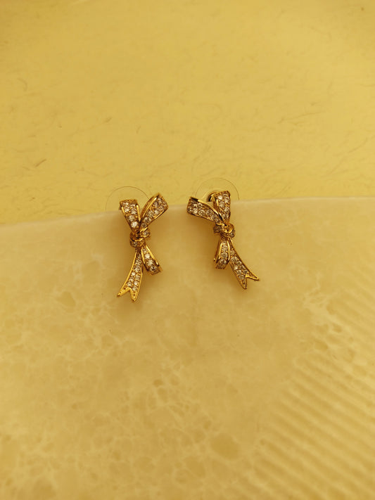 142 Gold Bowtie Studs