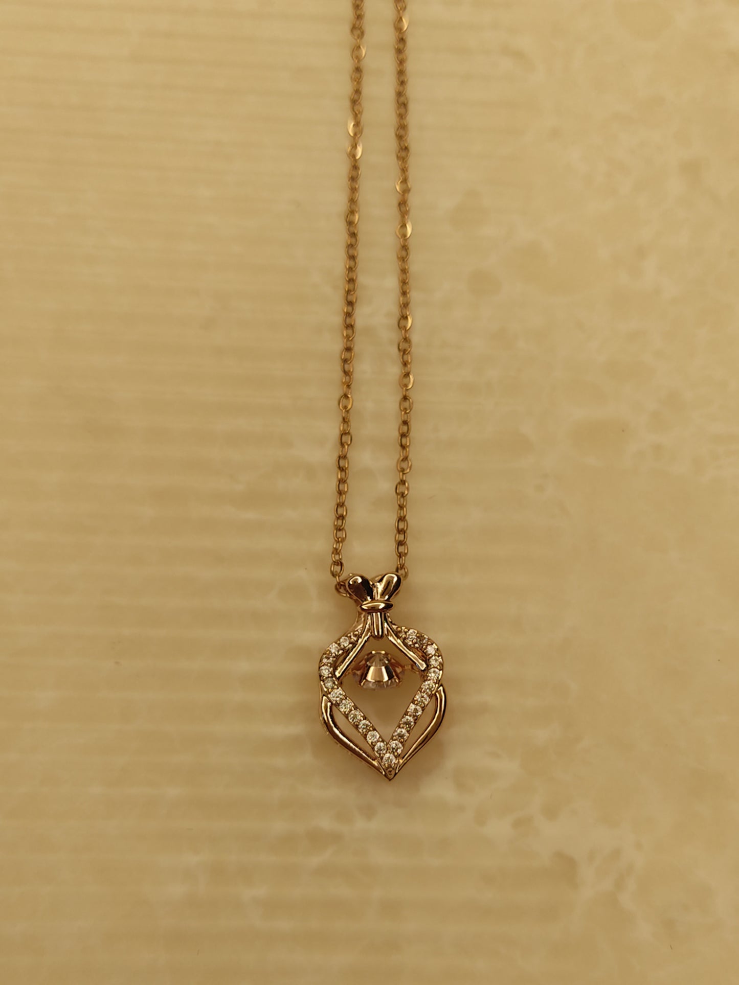 216  Rose Gold Potli Necklace